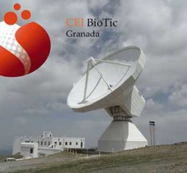 Fotografía de un satélite ubicado en Sierra Nevada de Granada y sobre la imagen el logotipo de CEI BioTic Granada