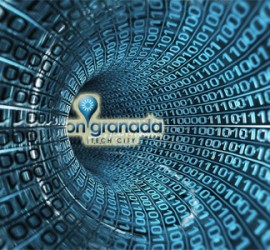 Código informático de un proyectos tecnológico y entre medias el logotipo de onGranada Tech City