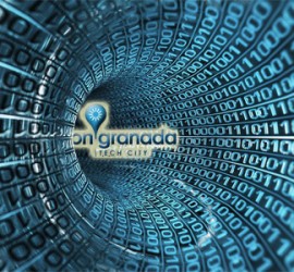 Código informático de un proyectos tecnológico y entre medias el logotipo de onGranada Tech City