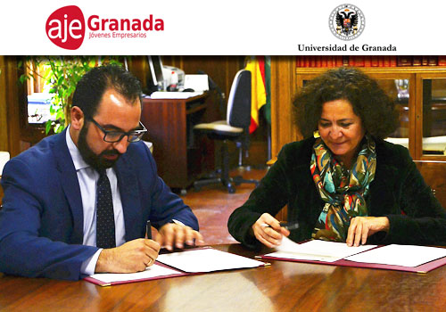 Melesio Peña (AJE Granada) y Pilar Aranda (UGR) formando el acuerdo para fomentar la tecnología y la I+D+i entre las empresas granadinas